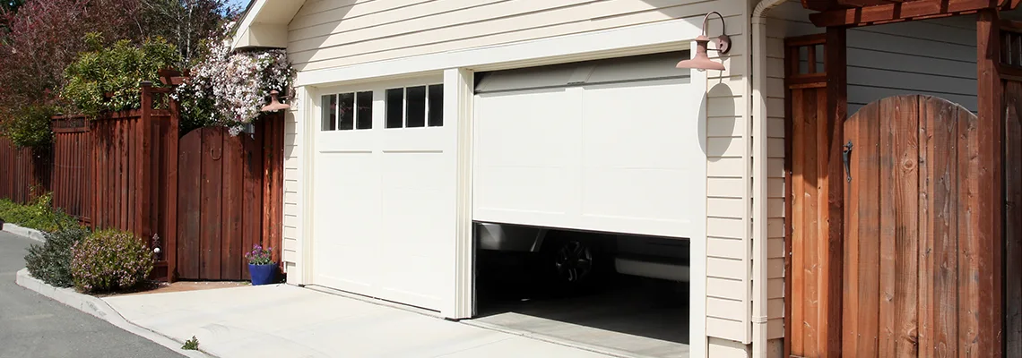 Fix Metal Garage Door Jerking in Davie, Florida